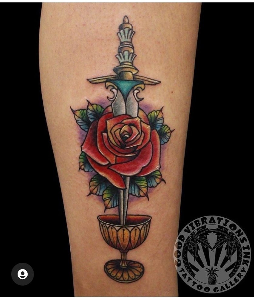 dagger in rose with cup tattoo