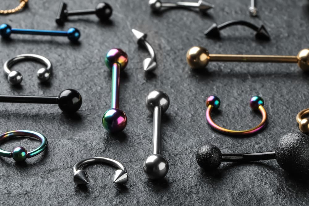 a bunch of different piercing jewelry